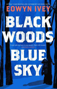 BLACK WOODS, BLUE SKY